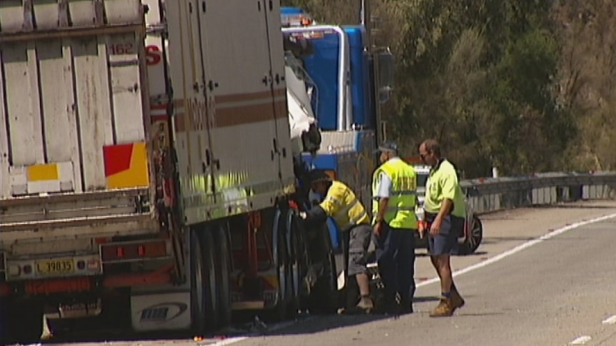 Police have examined the truck which slammed into the back of another slow-moving truck.