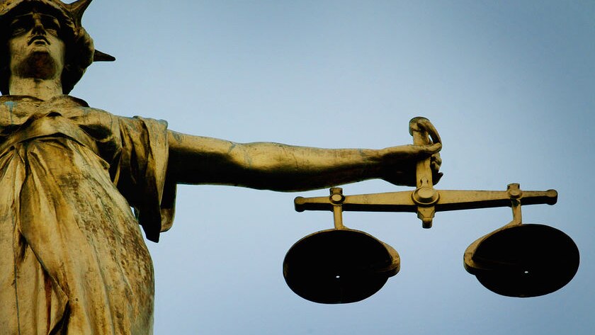 Statue holding the scales of justice (Reuters)