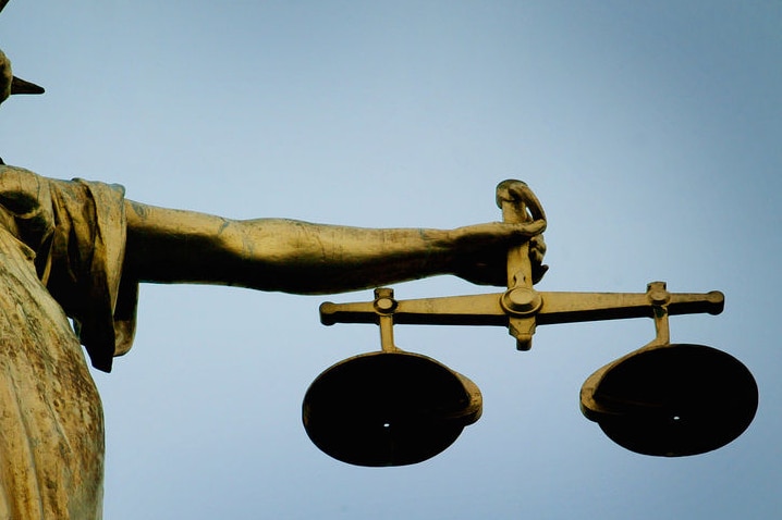 Statue holding the scales of justice (Reuters)