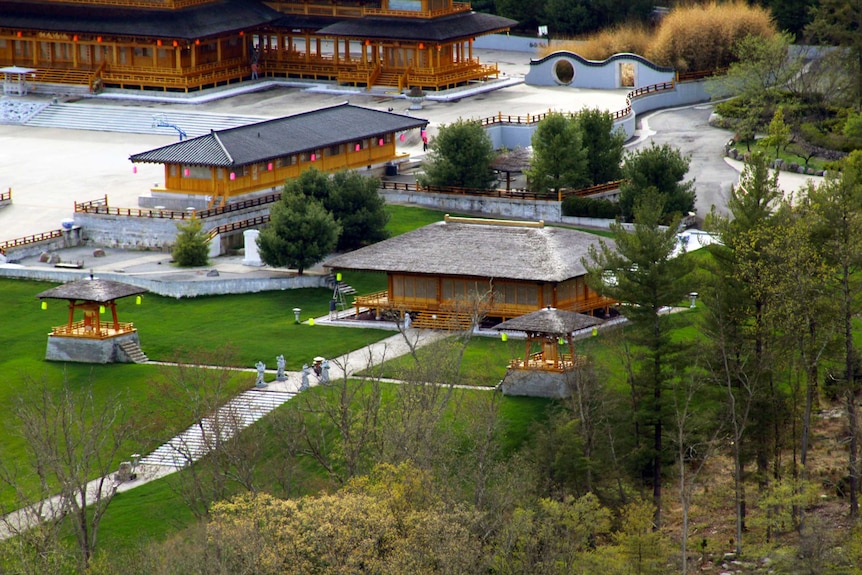 A lawn and statues at Dragon Springs.