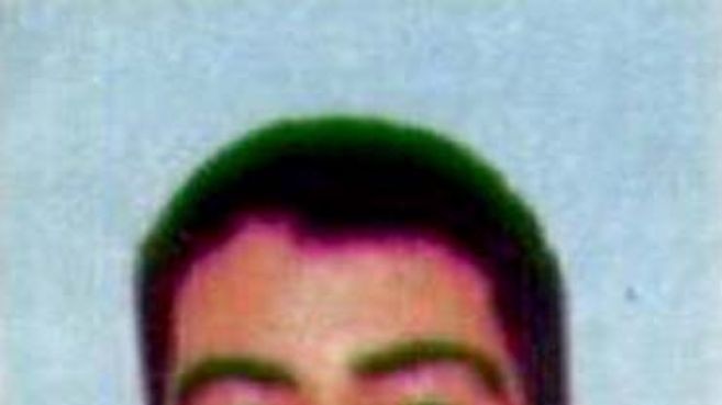 An identity photograph posted on the Interpol site allegedly showing Joshua Aaron Krycer
