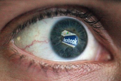 File photo: The Social networking site Facebook is reflected in the eye of a man (Getty: Dan Kitwood)