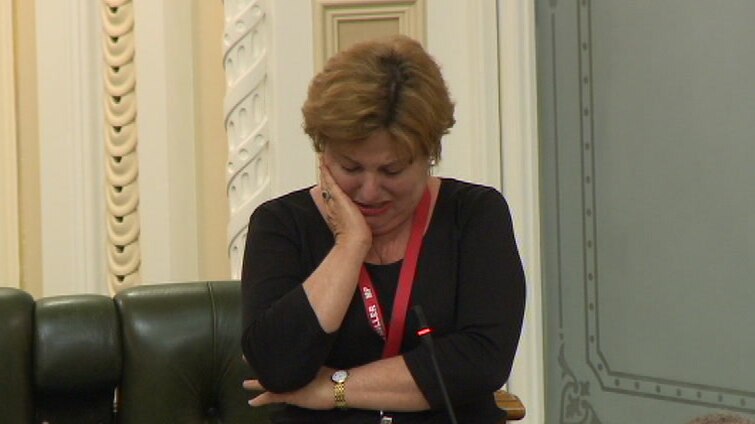 Former Queensland police minister Jo-Ann Miller speaks through tears in Queensland Parliament.