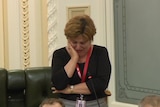 Former Queensland police minister Jo-Ann Miller speaks through tears in Queensland Parliament.
