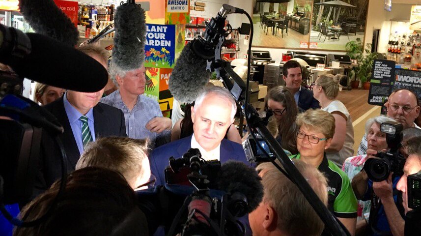 The Prime Minister talks to shoppers in Brisbane on day two of the election campaign