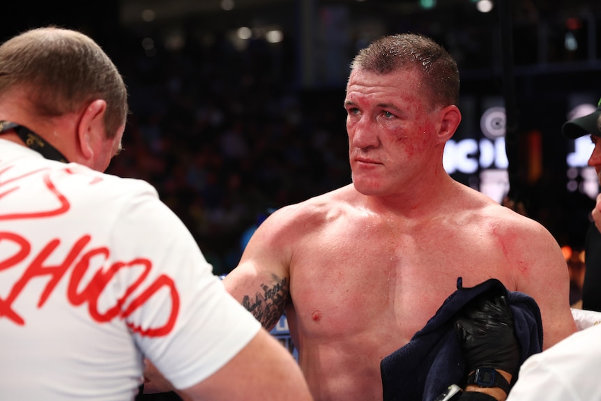 Paul Gallen stands with a neutral expression on his face