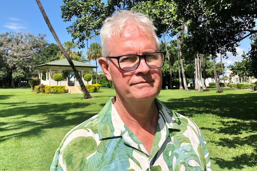 Headshot of Townsville-based economist Colin Dwyer in a park.