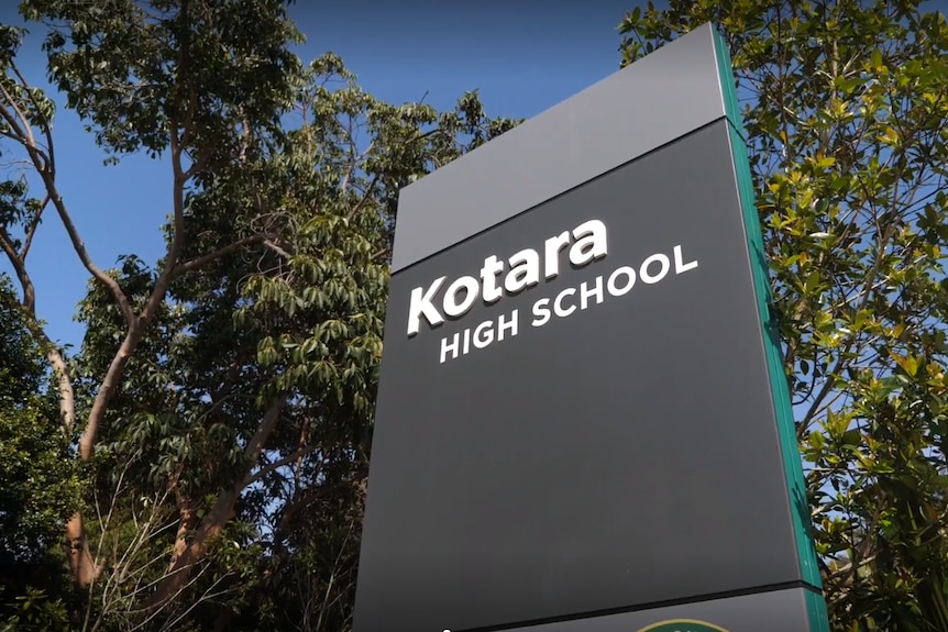 Sign which says kotara high school outside of school dates