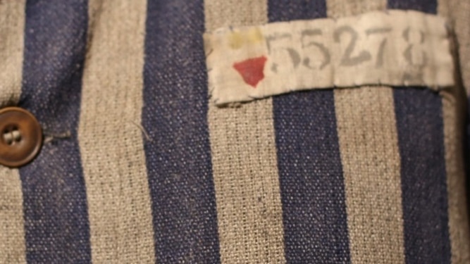 Close up of number label on Holocaust inmate uniform