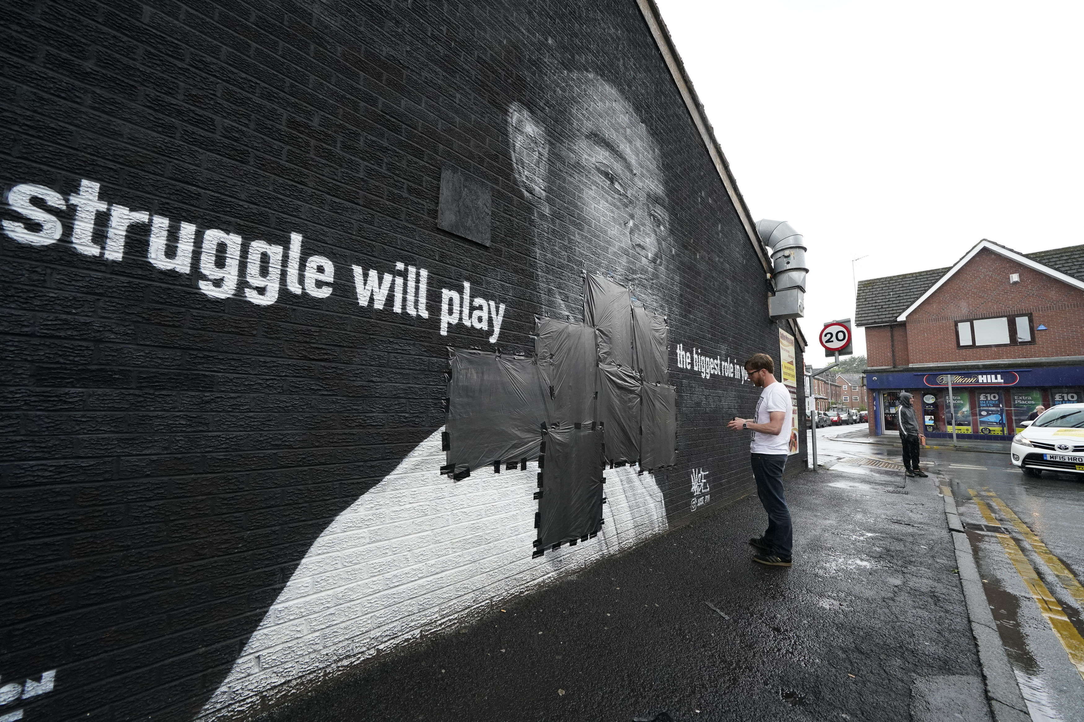 Police investigate defacing of England football star's mural as Prince William labels abuse 'abhorrent'