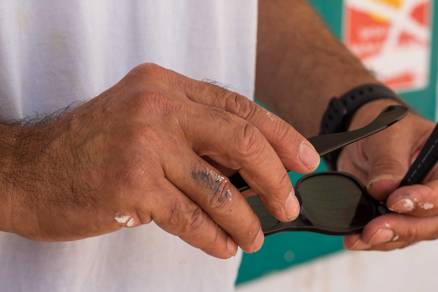 Fereydoun's hands