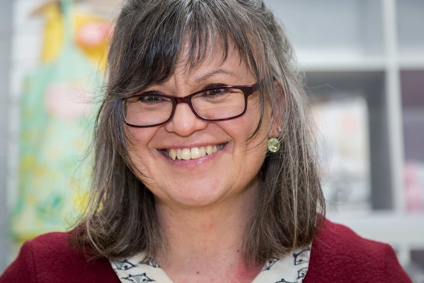 Close up picture of haberdashery store owner Fiona Leehane in her store in Kyneton.