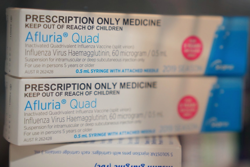 Influenza vaccination sitting in the fridge of the pharmacy