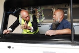John Howard talks to auto electrician Peter Hunter