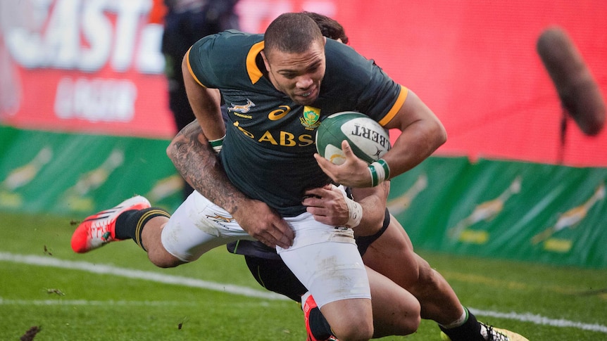 Habana is tackled against World XV