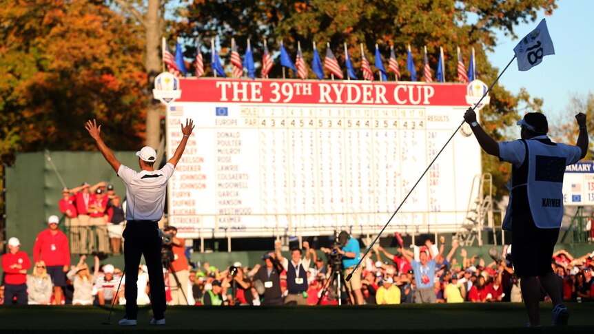 Iconic moment: Martin Kaymer celebrates his famous putt on the 18th.