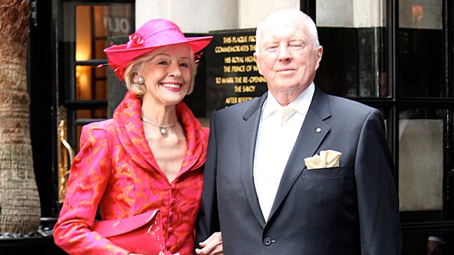 Governor-General Quentin Bryce with her husband Michael Bryce pose for a photograph before the royal wedding in London
