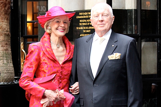 Governor-General Quentin Bryce with her husband Michael Bryce pose for a photograph before the royal wedding in London