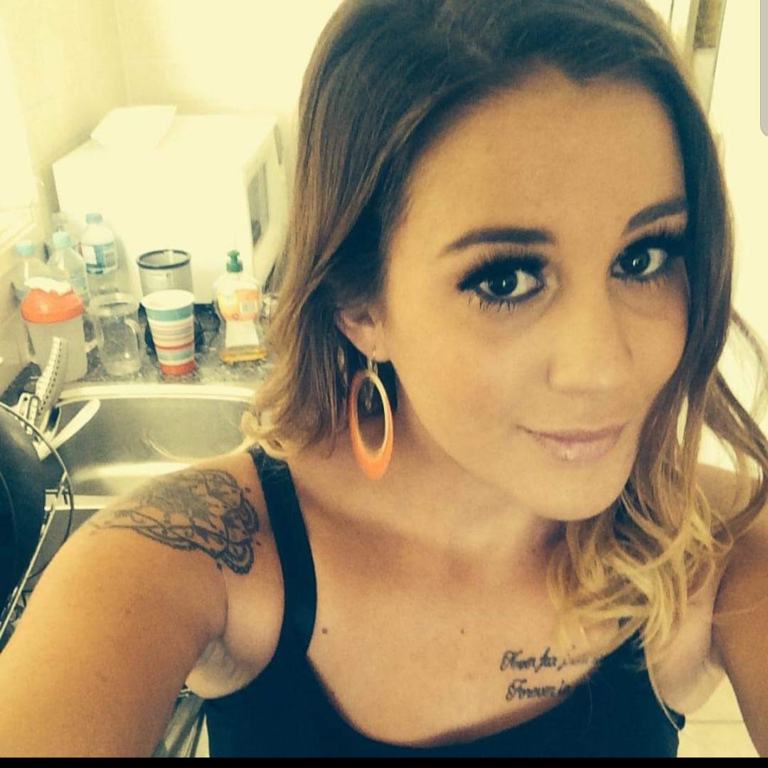 Woman with hoop earrings.