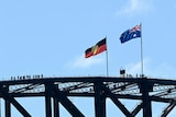 The Aboriginal flag and the Australian flag on top of a large structure