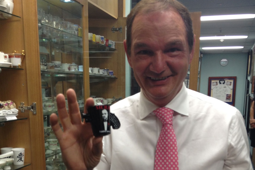 Ipswich Mayor Paul Pisasale posing with a Sicilian demitasse in September 2013.