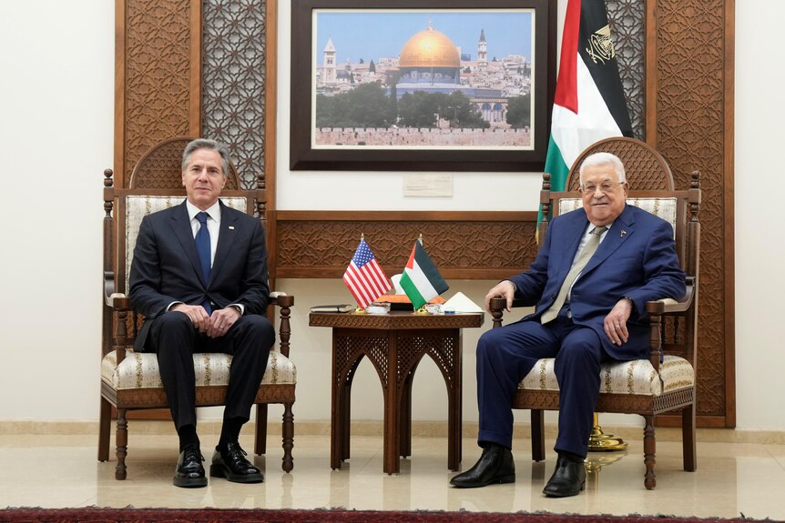 US Secretary of State Antony Blinken and Palestinian President Mahmoud Abbas sitting in chairs.