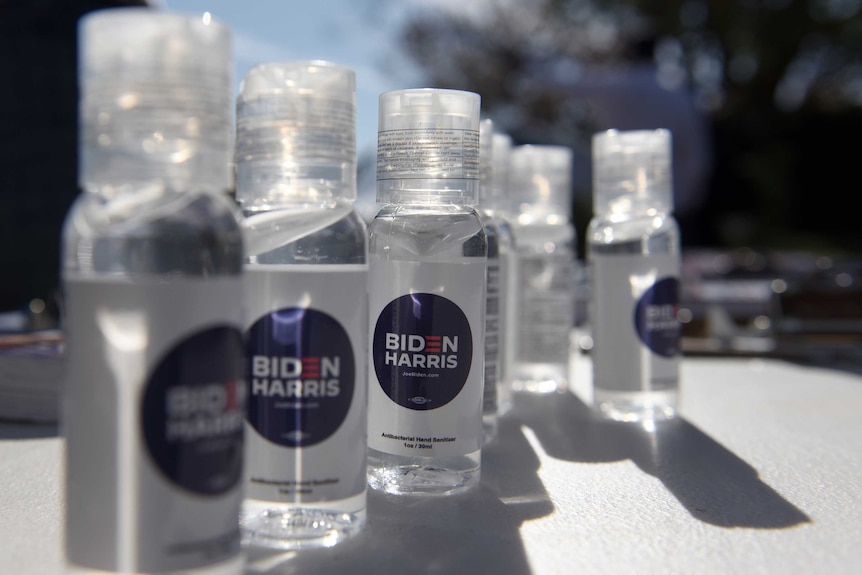 Bottles of hand sanitizer put out by the Joe Biden campaign