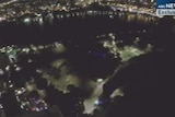 Base jumpers leap from a Brisbane CBD building
