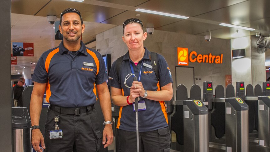 Guide Dog Queensland instructors Bashir Ebrahim and Jodie Caldwell help visually impaired people learn how to become independent