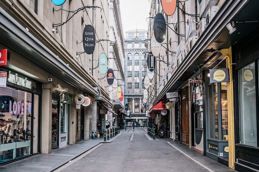 A view down an empty Degraves Street in daylight.