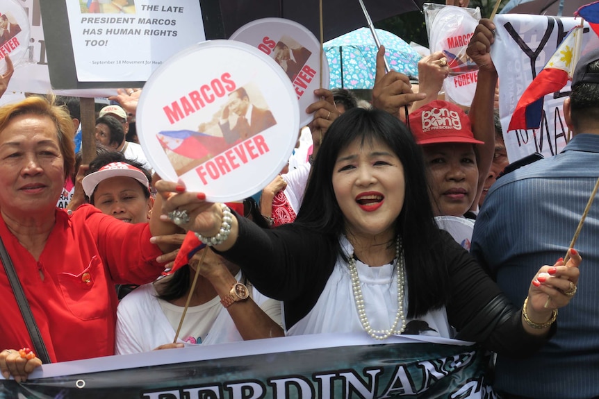 Pro-Marcos supporters rally outside the Supreme Court in Manila.