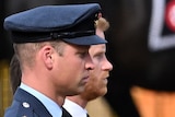 Prince William and Prince Harry march behind Queen Elizabeth II's coffin