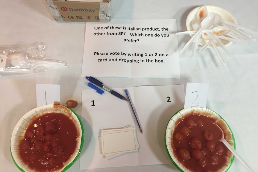 Two tomato products in bowls for growers to taste test