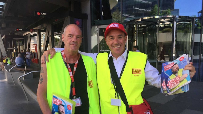 NAB boss Andrew Thorburn and Big Issue seller Allan Crabbe outside NAB's Melbourne HQ