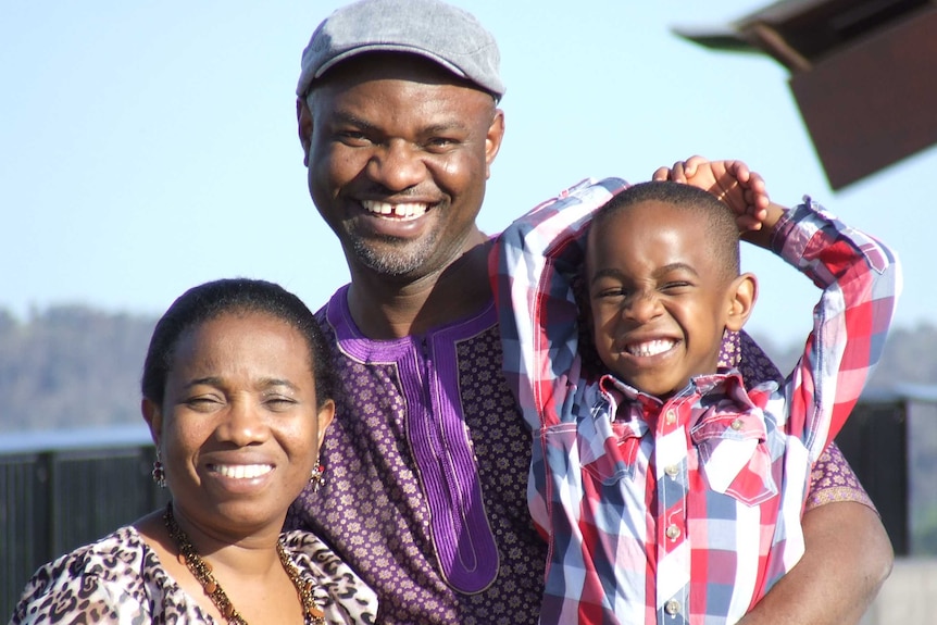 Kingsley Omosigho with his wife and son
