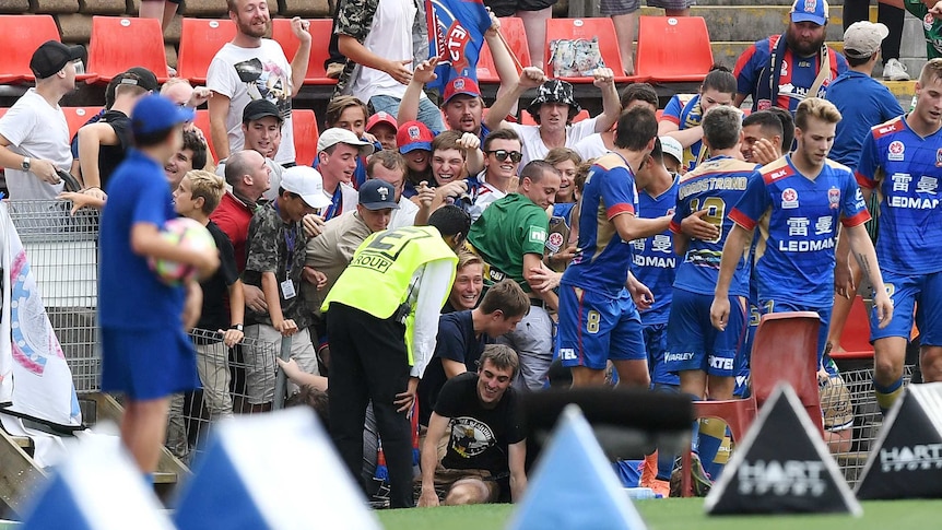 Fans scramble in fence collapse at Newcastle Jets game