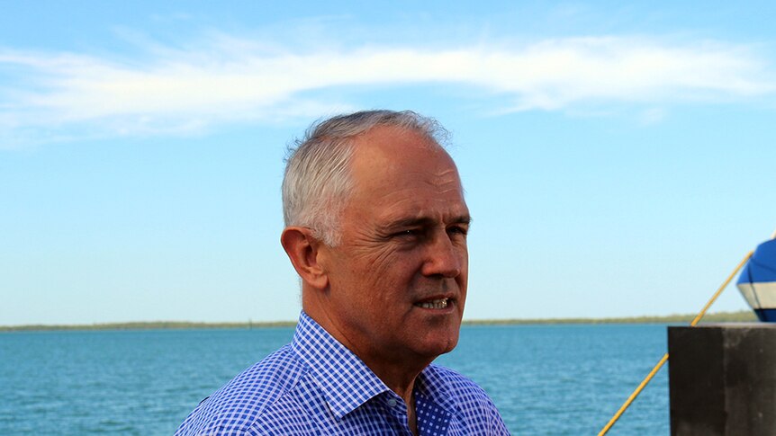 Prime Minister stands on Darwin's East Arm Wharf