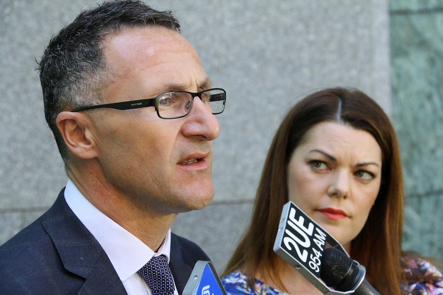 Greens Leader Richard Di Natale and Greens senator, Sarah Hanson-Young, speak at a press conference.