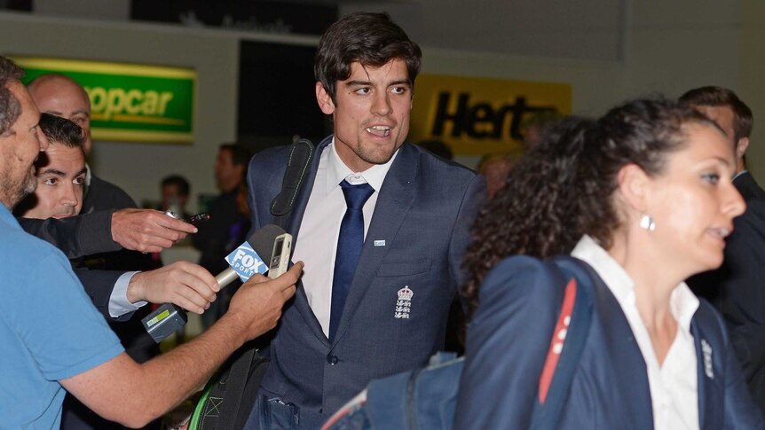 Ready to go ... Captain Alastair Cook (C) arrives with the England squad in Perth