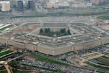 An aerial shot shows the five-sided Pentagon building sitting near a major highway.