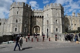 Windsor Castle wardens stand outside Windsor Castle following Prince Philip's death.