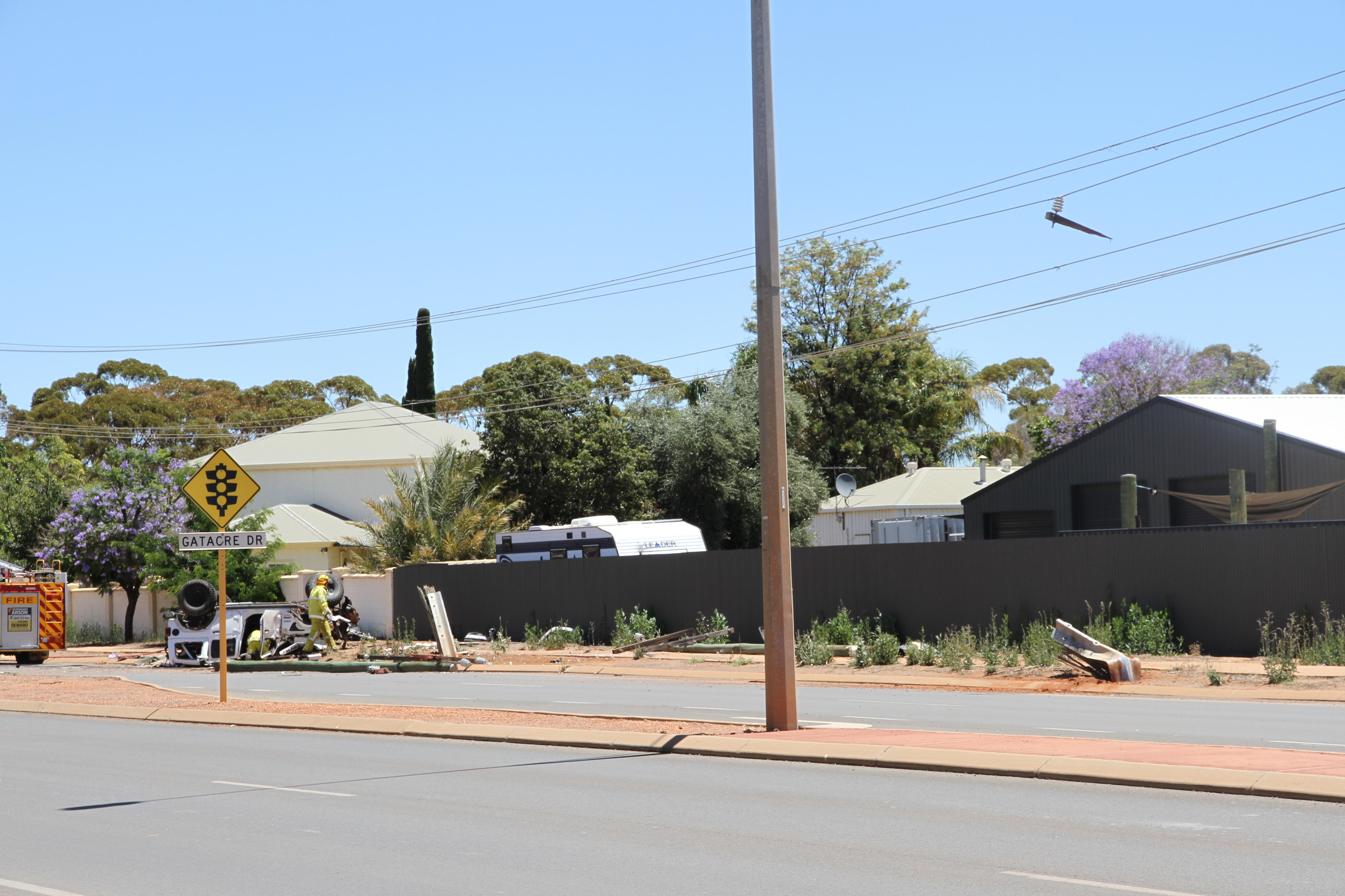 Driver confirmed dead after crash flattens power poles, leaves car ...