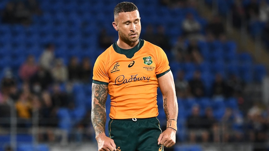 A Wallabies player stands and reflects after kicking the winning penalty goal against the Springboks.