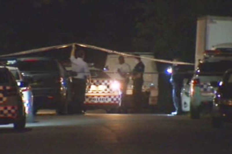 Police cars at scene of murder of man outside home at Kuraby on Brisbane's southside.