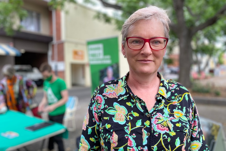 Amanda Findley poses for a profile photo at a greens polling booth. 
