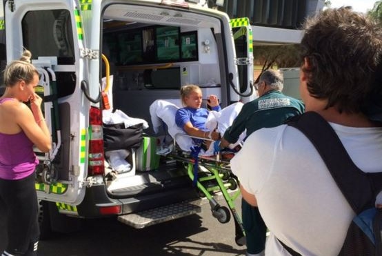 Olympic hopeful Liz Parnov being put into the ambulance after suffering the injury at training.