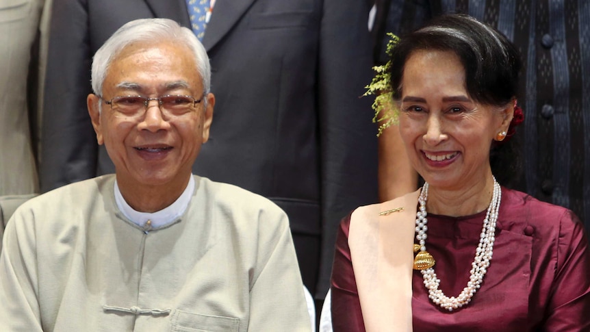 Myanmar's President Htin Kyaw sits next to Aung San Suu Kyi.