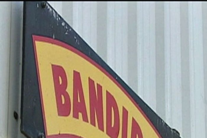 A member of the Bandidos motorcycle club was shot and killed outside the gang's club house.