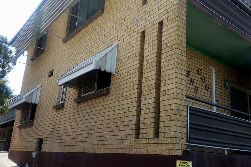 The toddler fell about five metres from the building at Coorparoo.