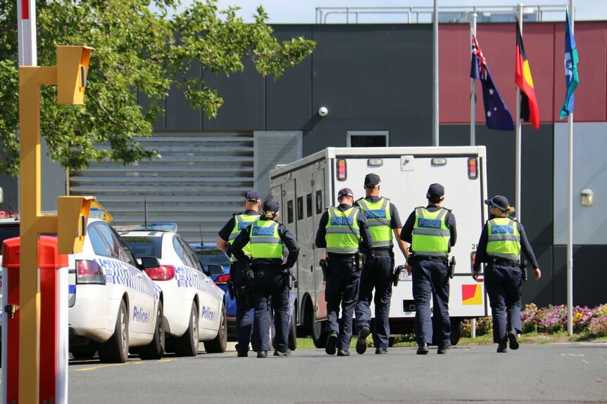 Police outside Melbourne Youth Justice Centre at Parkville